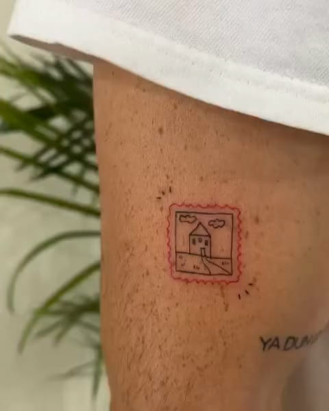 Postage stamp with a house, red scalloped border, fine line tattoo