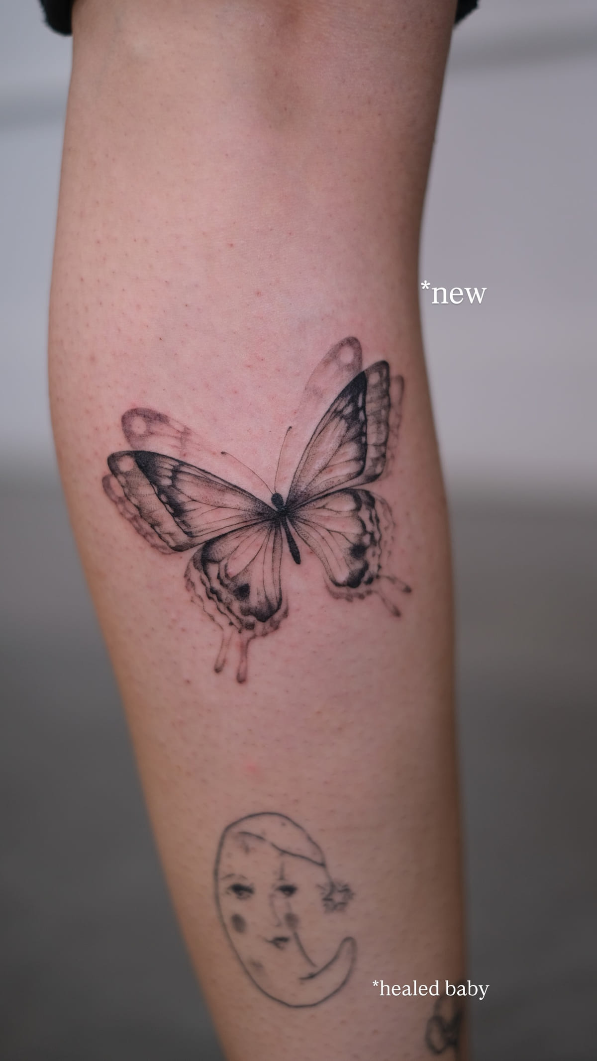 Shaded butterfly and the moon with a face, healed fine line tattoo, the day it was made