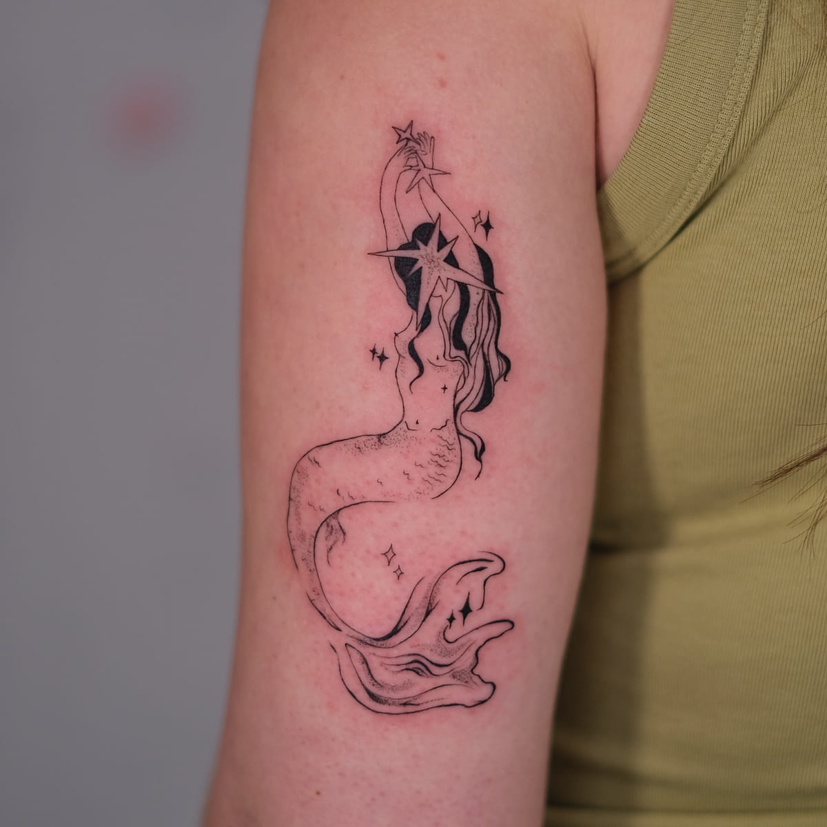Mermaid reaching up to a star, another view
