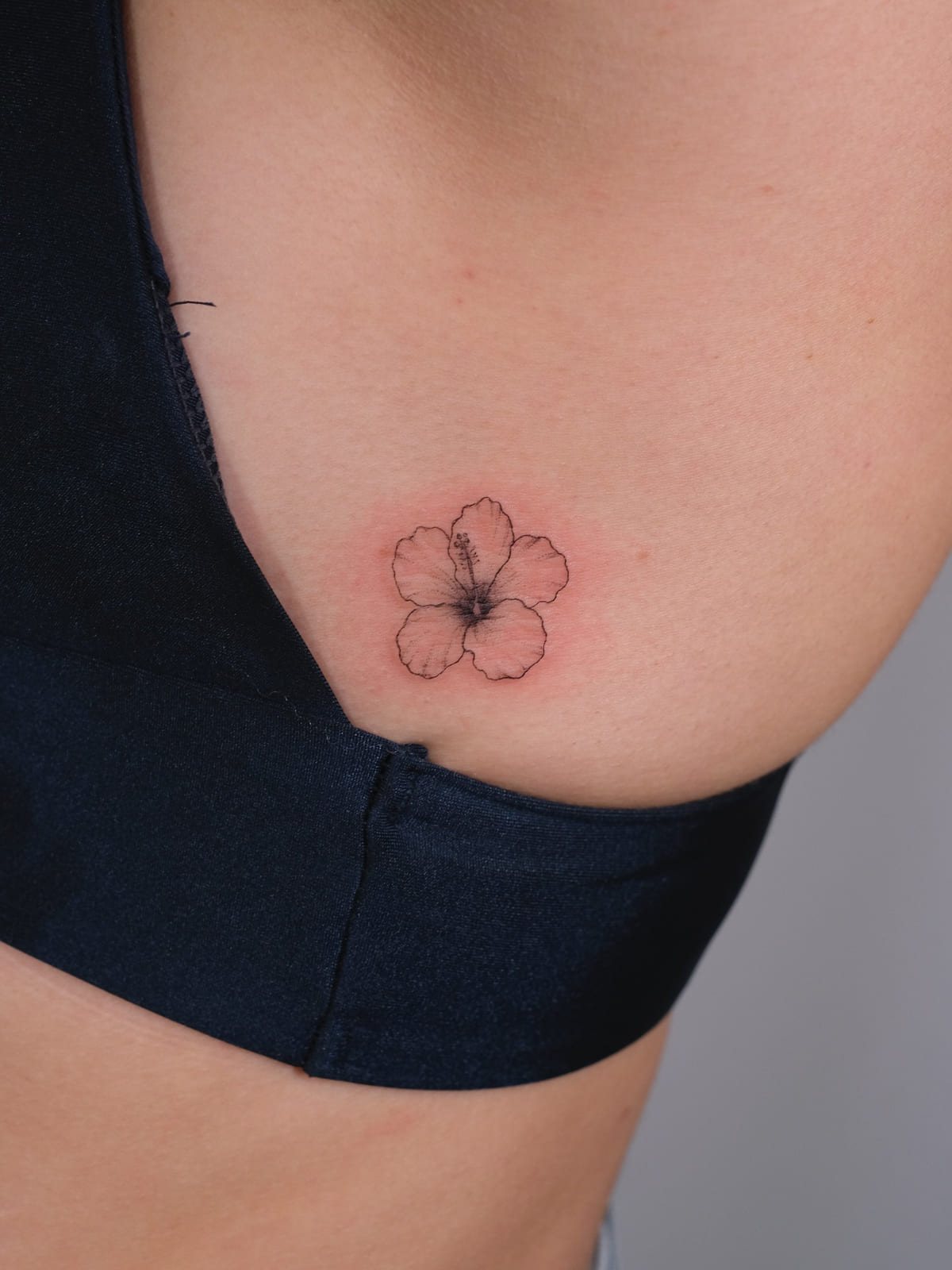 Hibiscus flower, fine line tattoo