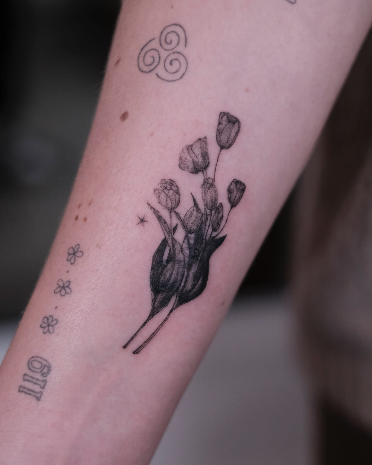 Bunch of tulips in soft black shading, fine line tattoo