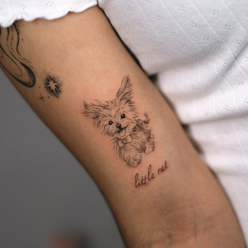 Small fluffy dog portrait with lettering, fine line tattoo