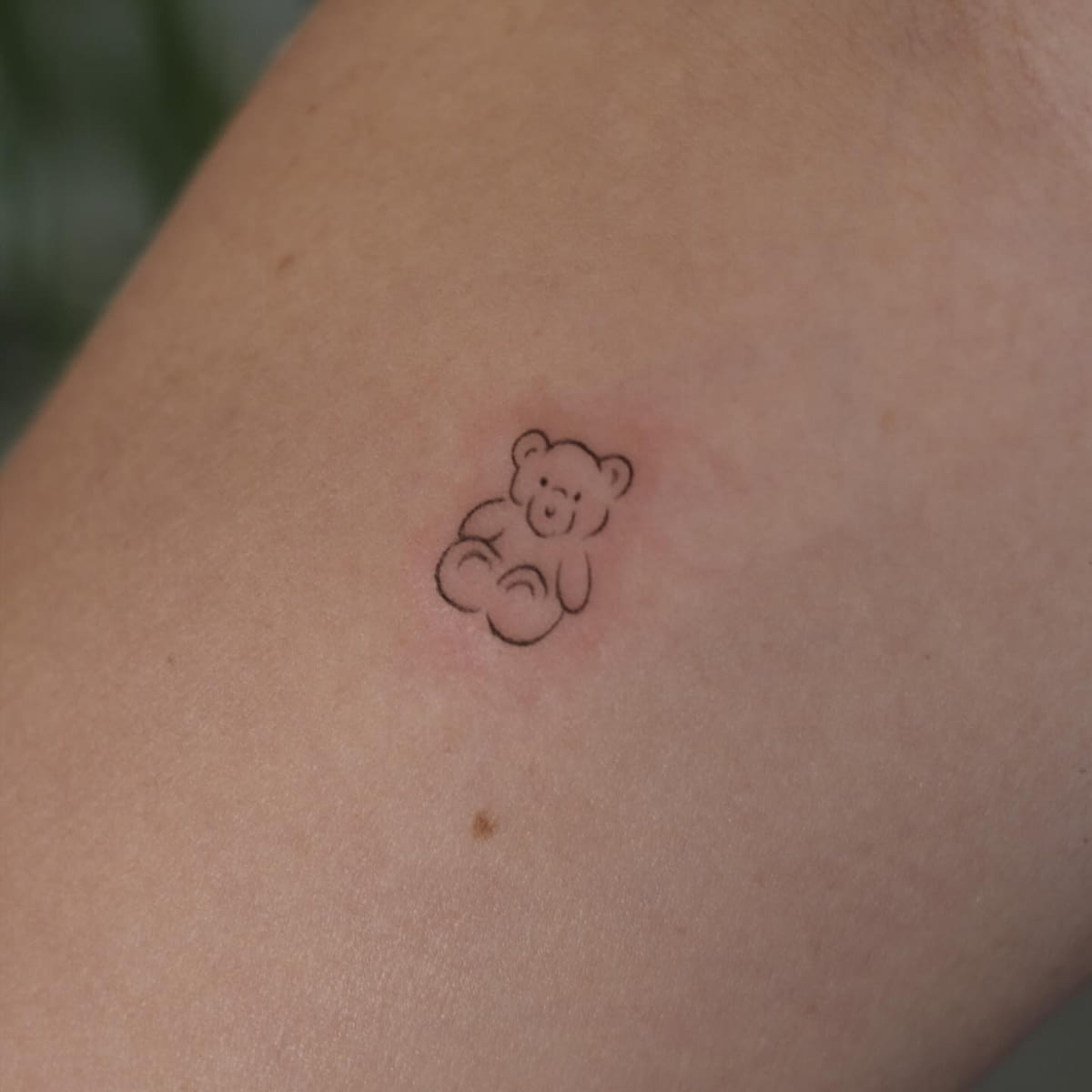 Tiny teddy bear outline, fine line tattoo