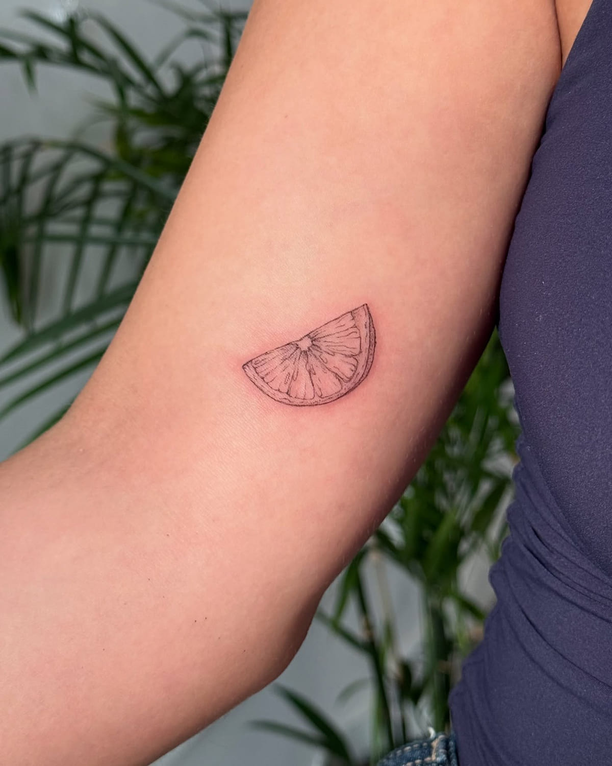 Citrus slice, fine line tattoo