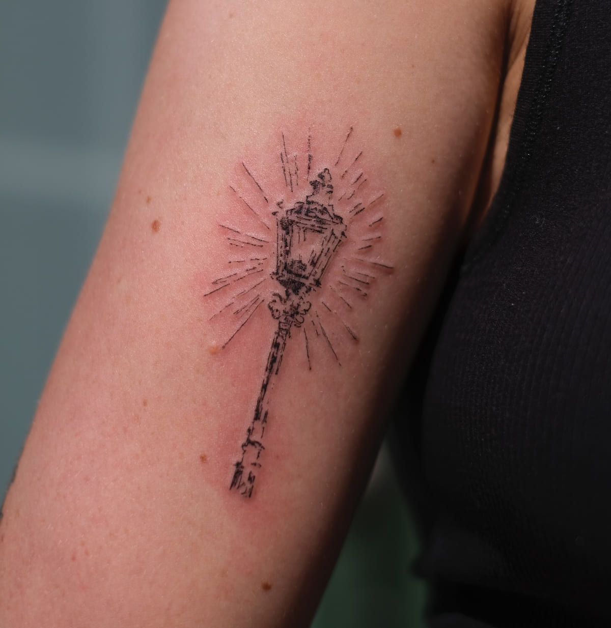 Glowing street lantern, fine line tattoo