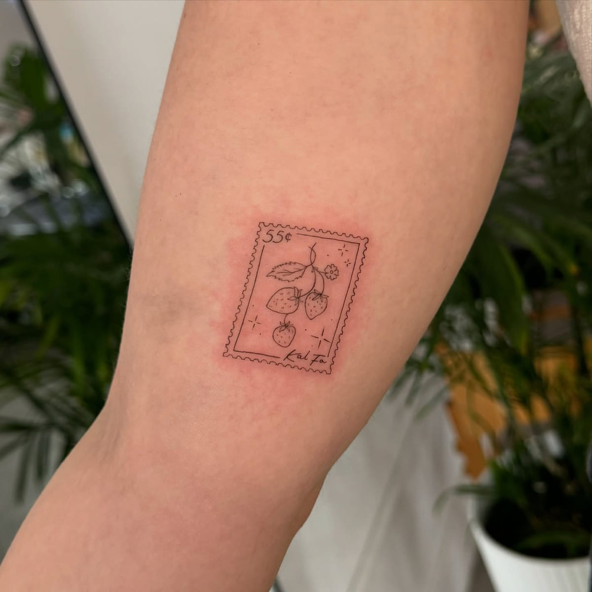 Postage stamp with strawberries, fine line tattoo