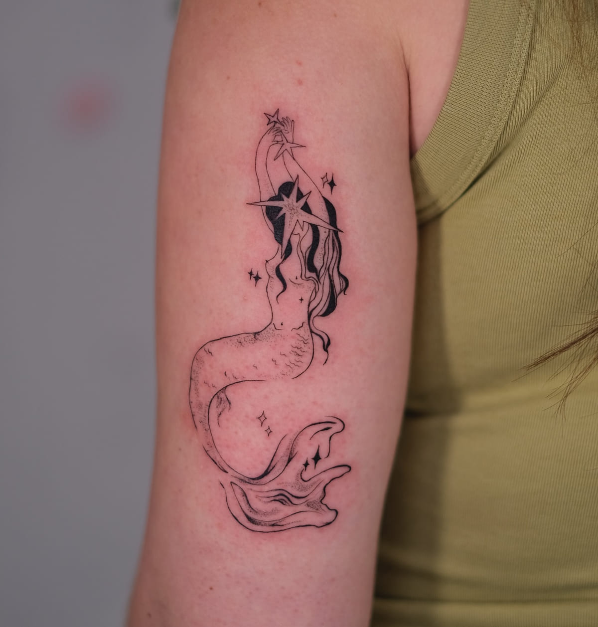 Mermaid reaching up to a star, another view