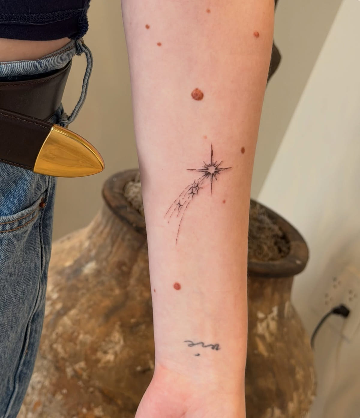 Shooting star with a trail, fine line tattoo