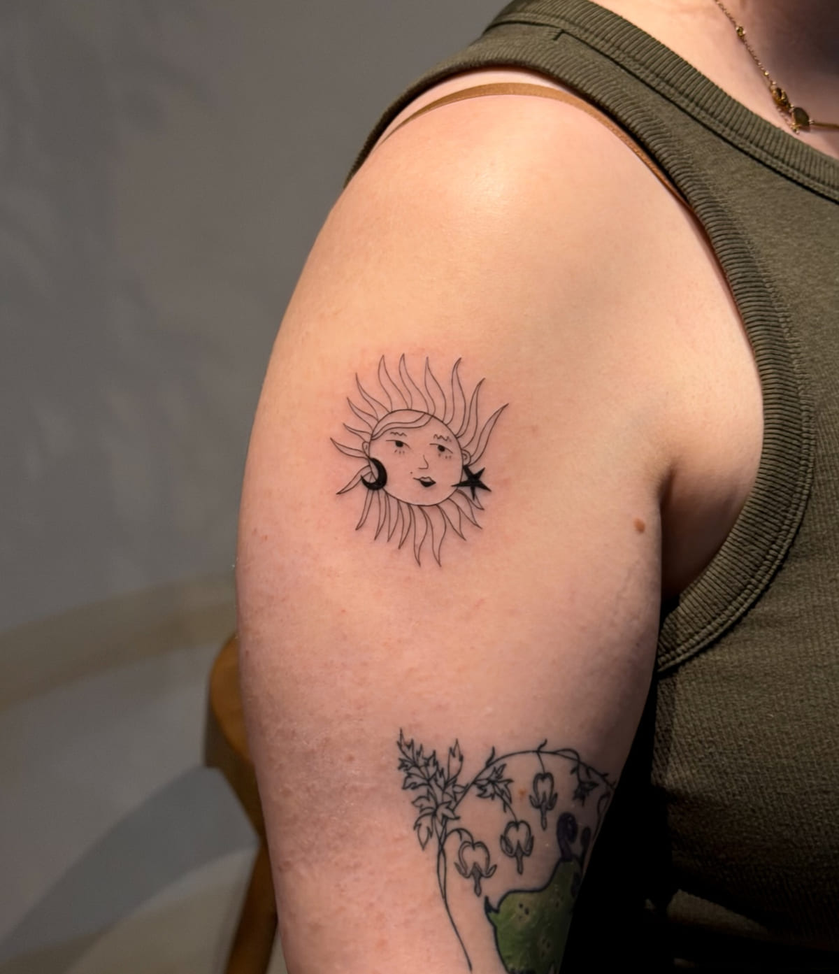 Sun with a face, moon and star, fine line tattoo