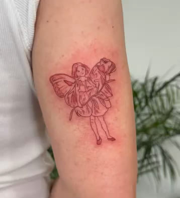 Flower fairy with forget me nots, after the classic illustration, fine line tattoo