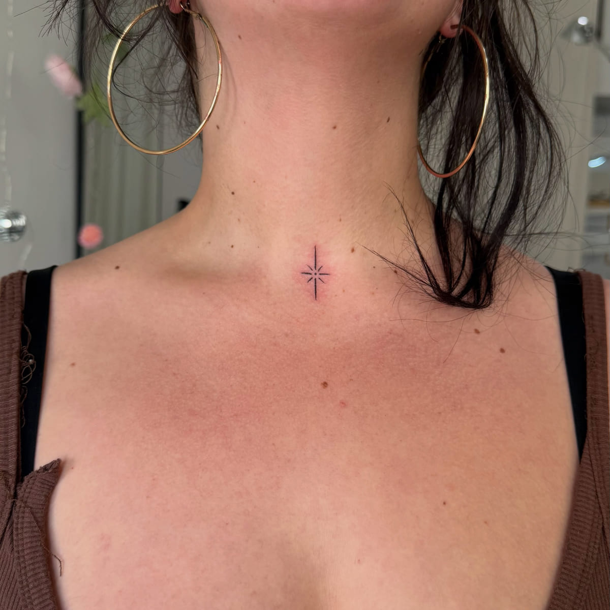 Tiny north star, fine line tattoo