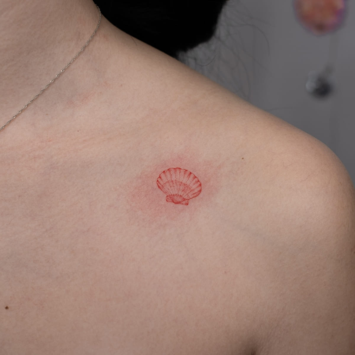 Scallop shell, fine line tattoo