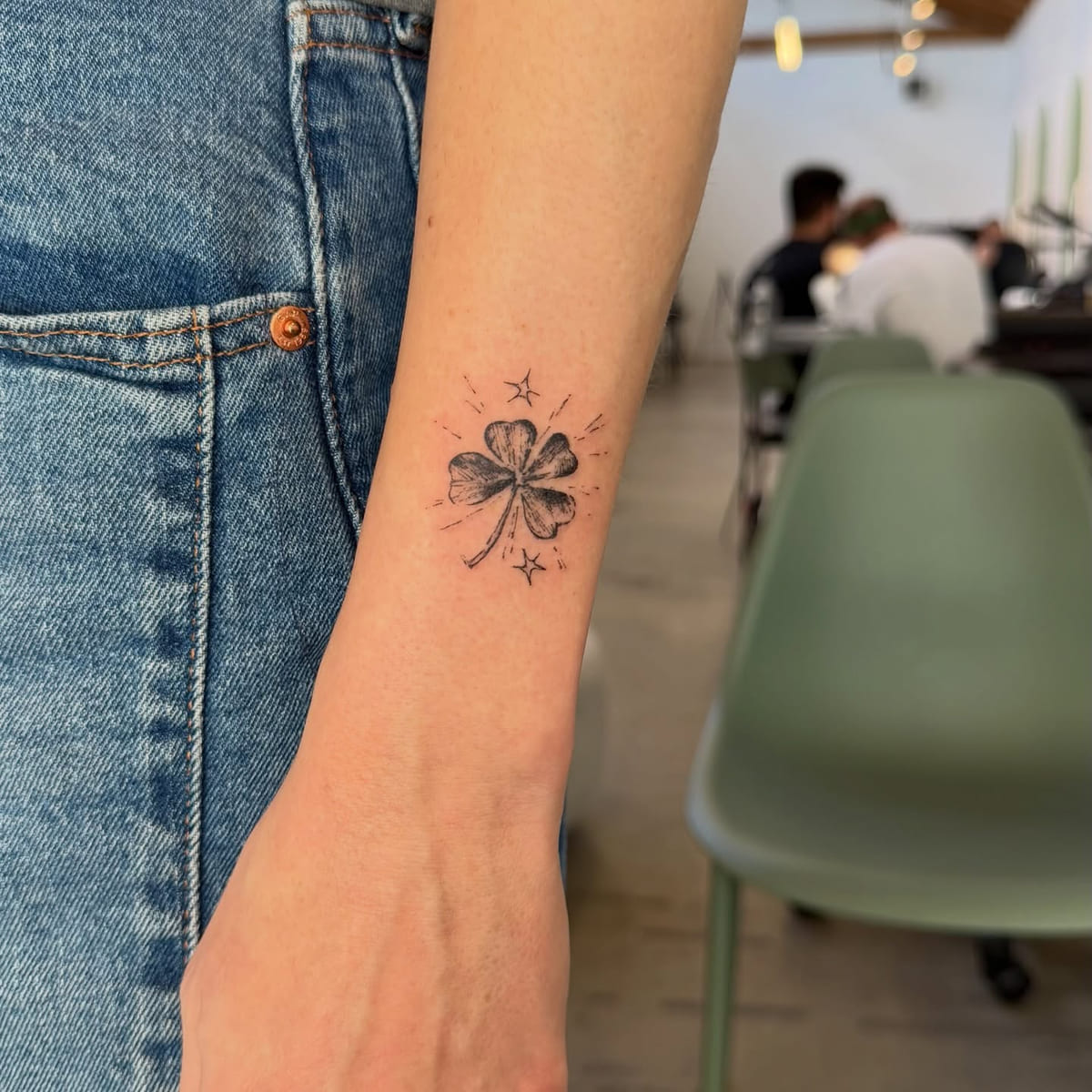 Four leaf clover with sparkles, fine line tattoo