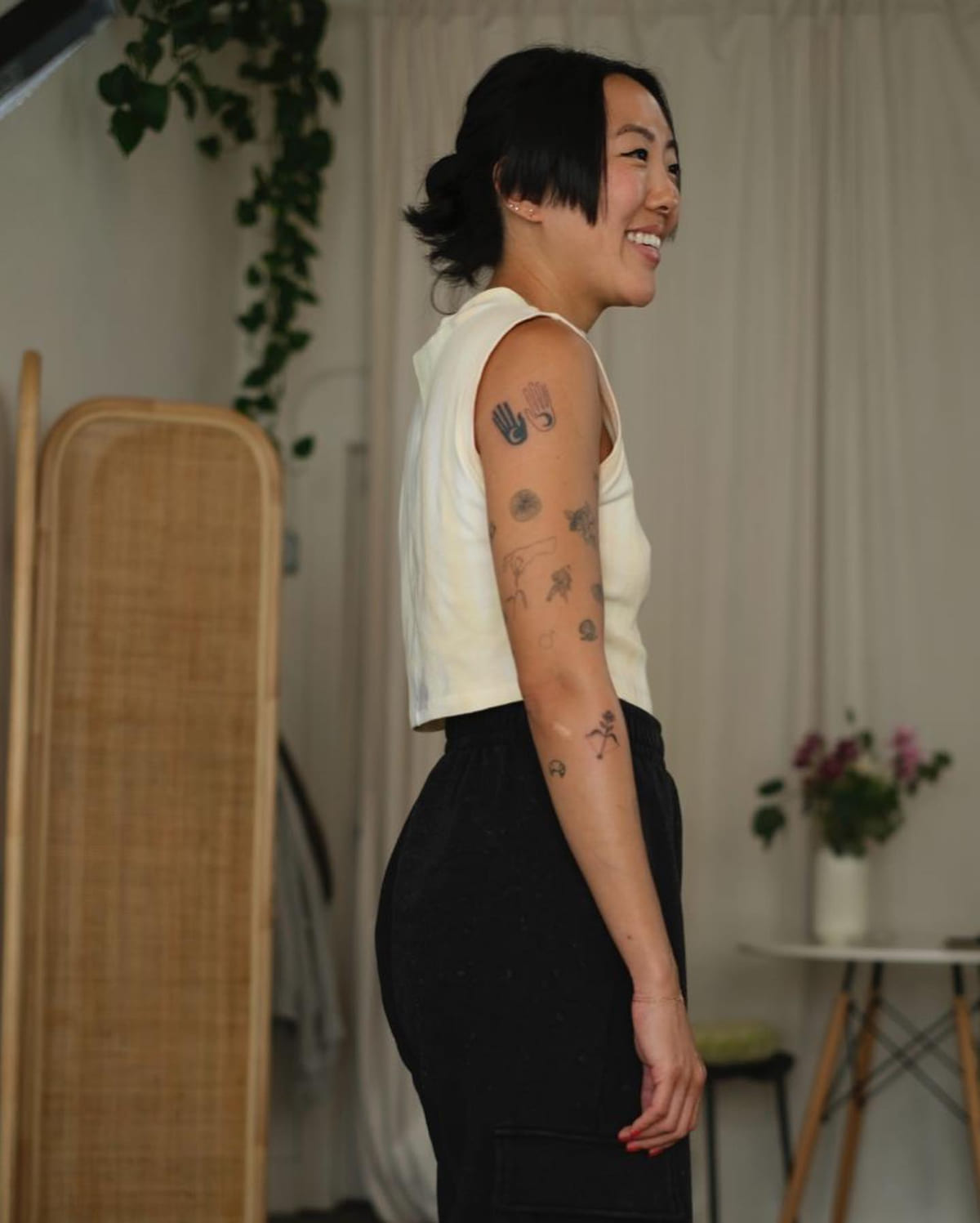 Pair of hands with crescent moons, one solid and one outline, another view
