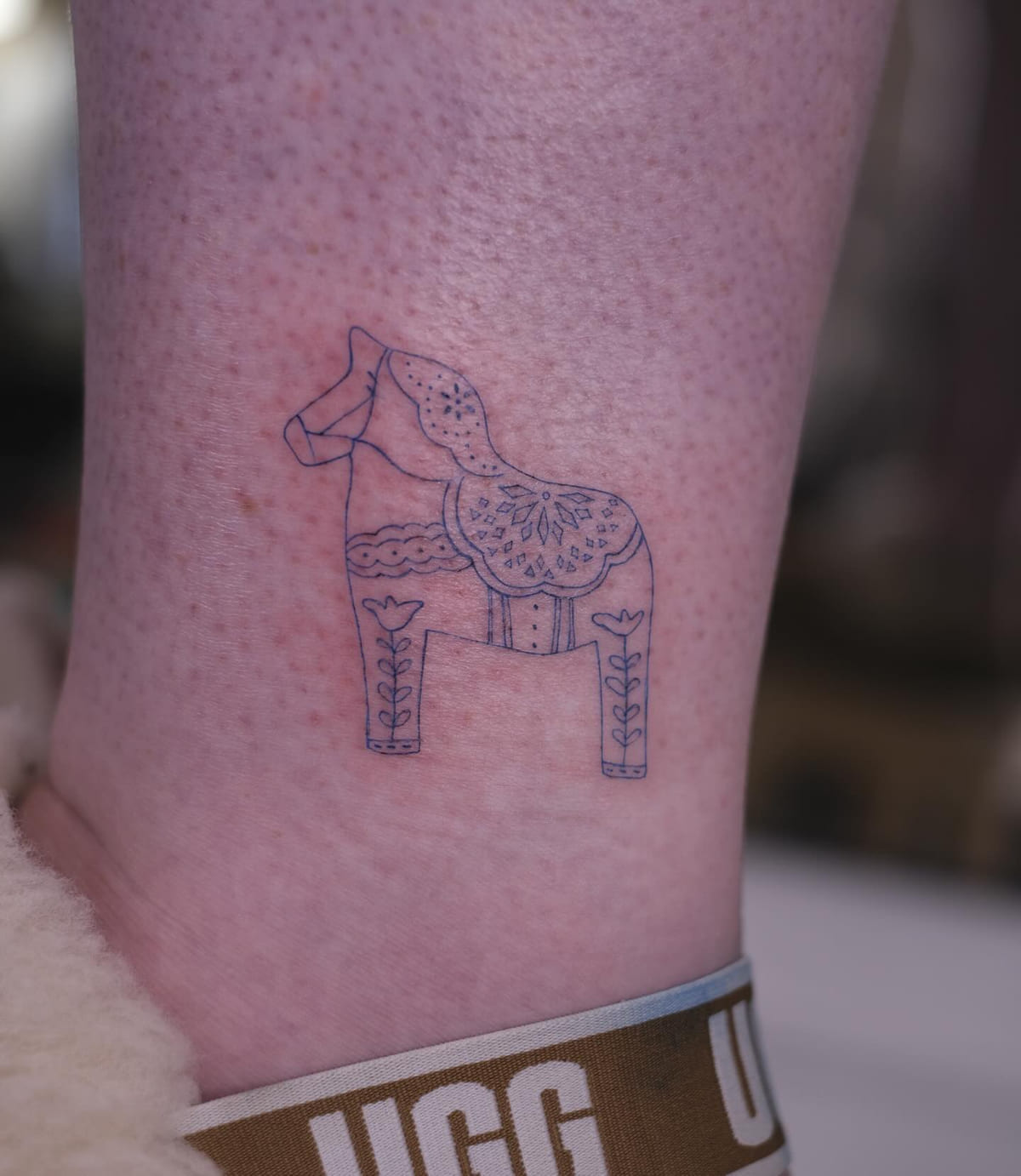 Dala horse in fine blue line, fine line tattoo