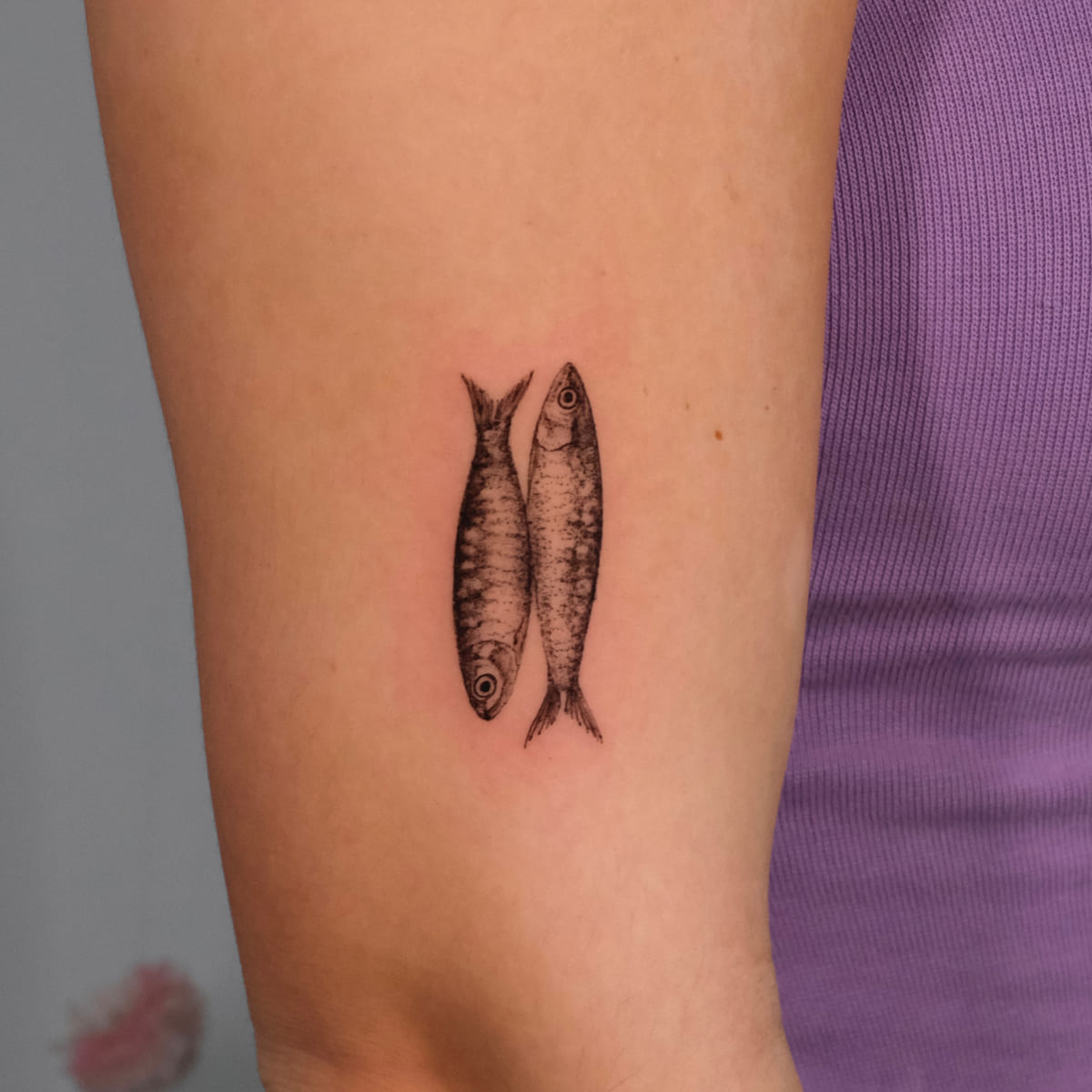 Two sardines, micro realism, fine line tattoo