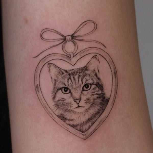 Cat in a heart, fine line tattoo