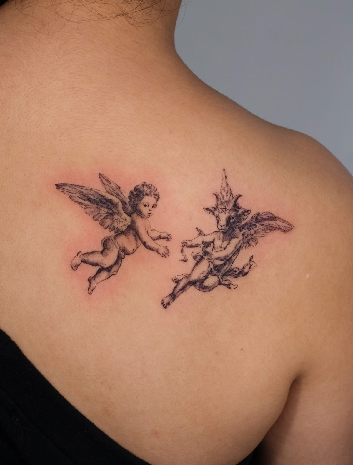 Two cherubs, micro realism, fine line tattoo