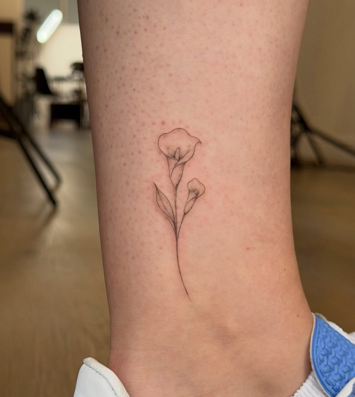Calla lily, single line stem, fine line tattoo