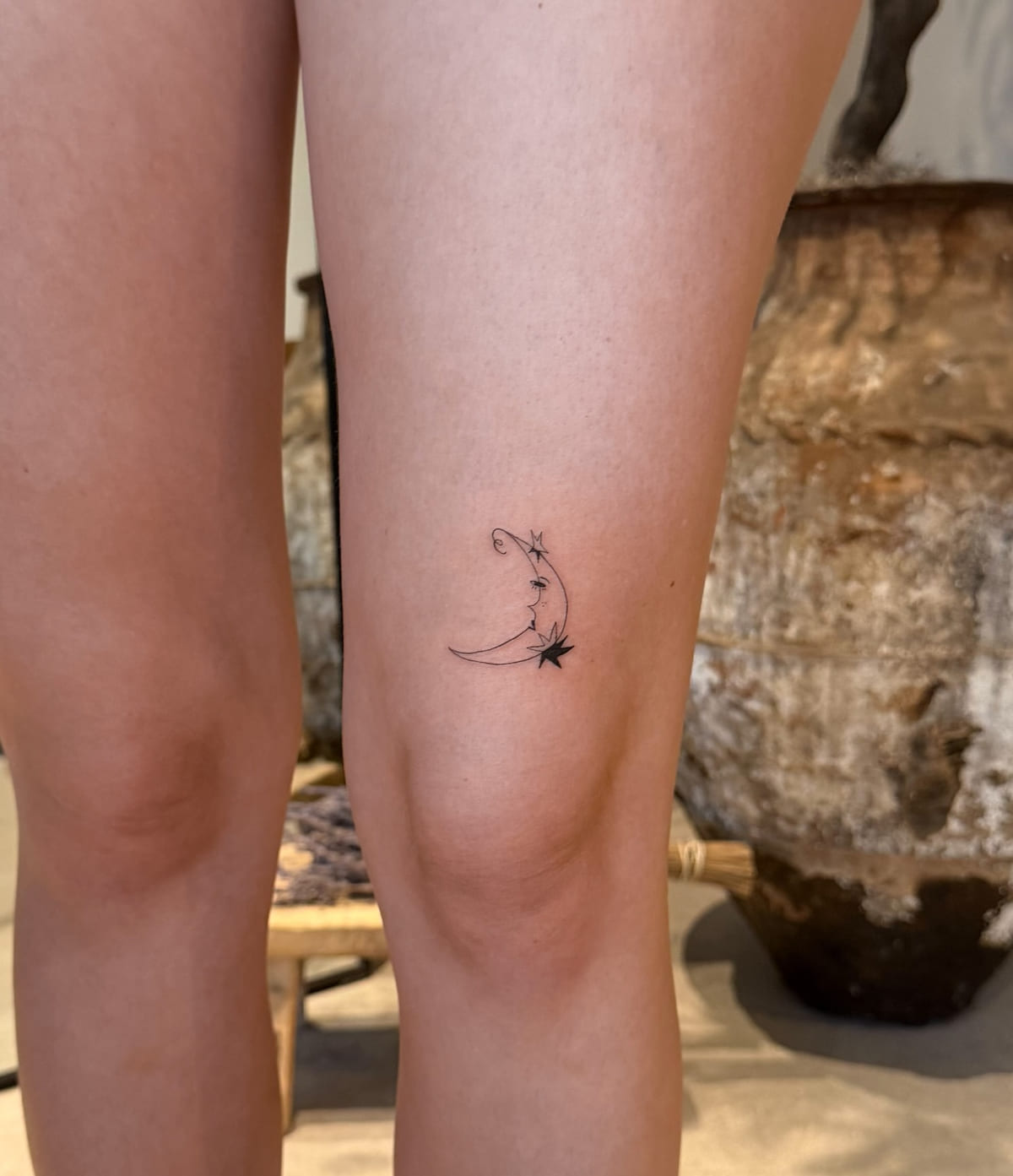 Crescent moon with a star, fine line tattoo