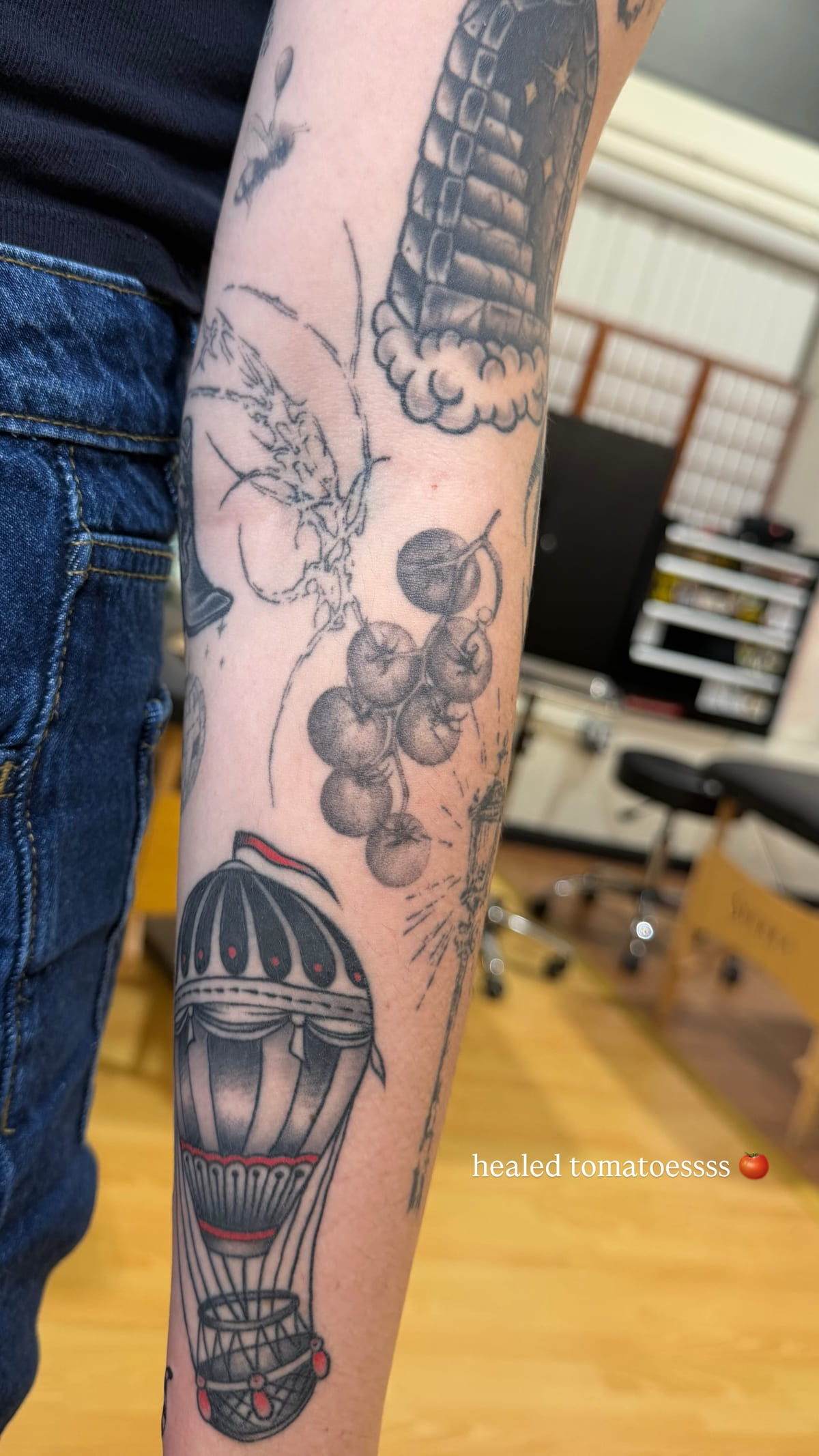 Cherry tomatoes on the vine, healed fine line tattoo, healed
